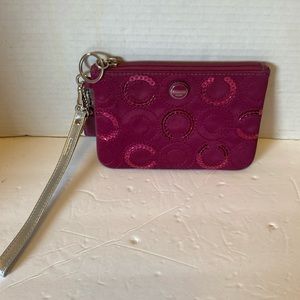 VGUC. Burgundy sequin, Coach satin wristlet.